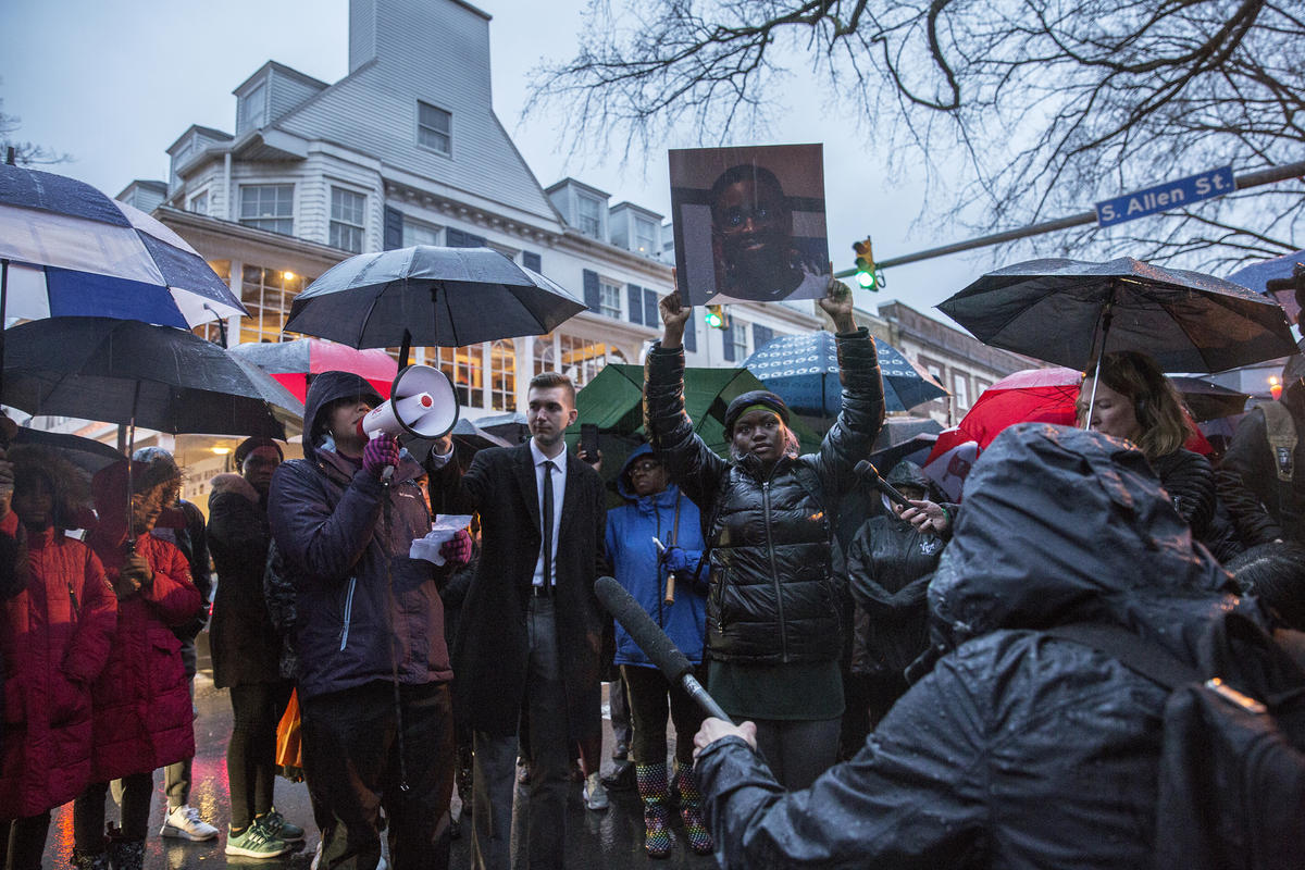 Several hundred people gathered at the Allen Street Gates in State College Thursday for a vigil for Osaze Osagie, who was fatally shot by police officers last week.