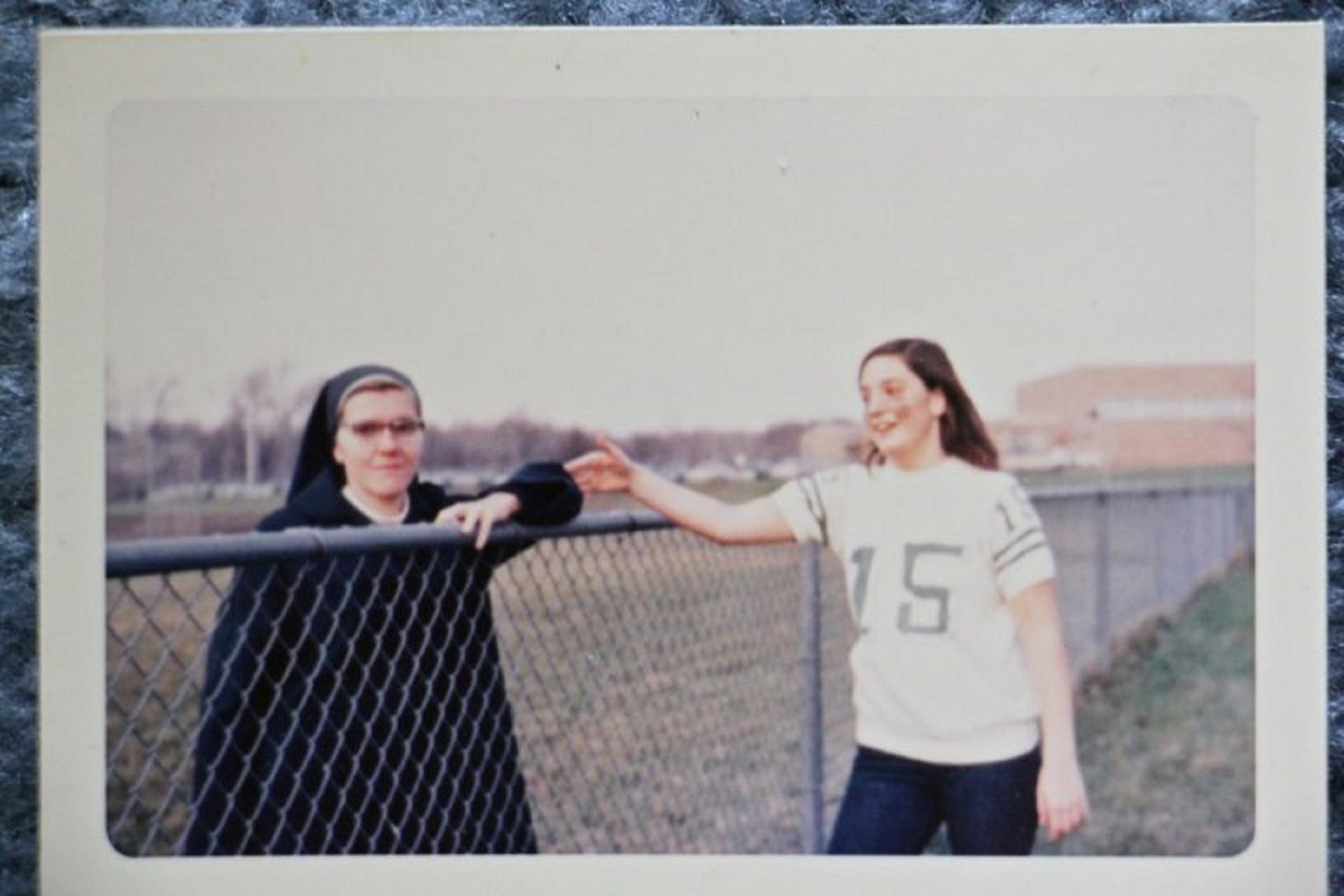 Patricia Cahill (right) greets Sister Eileen Shaw, the nun she says sexually abused her, at an event at Paramus Catholic High School, Bergen County, N.J. in 1970.