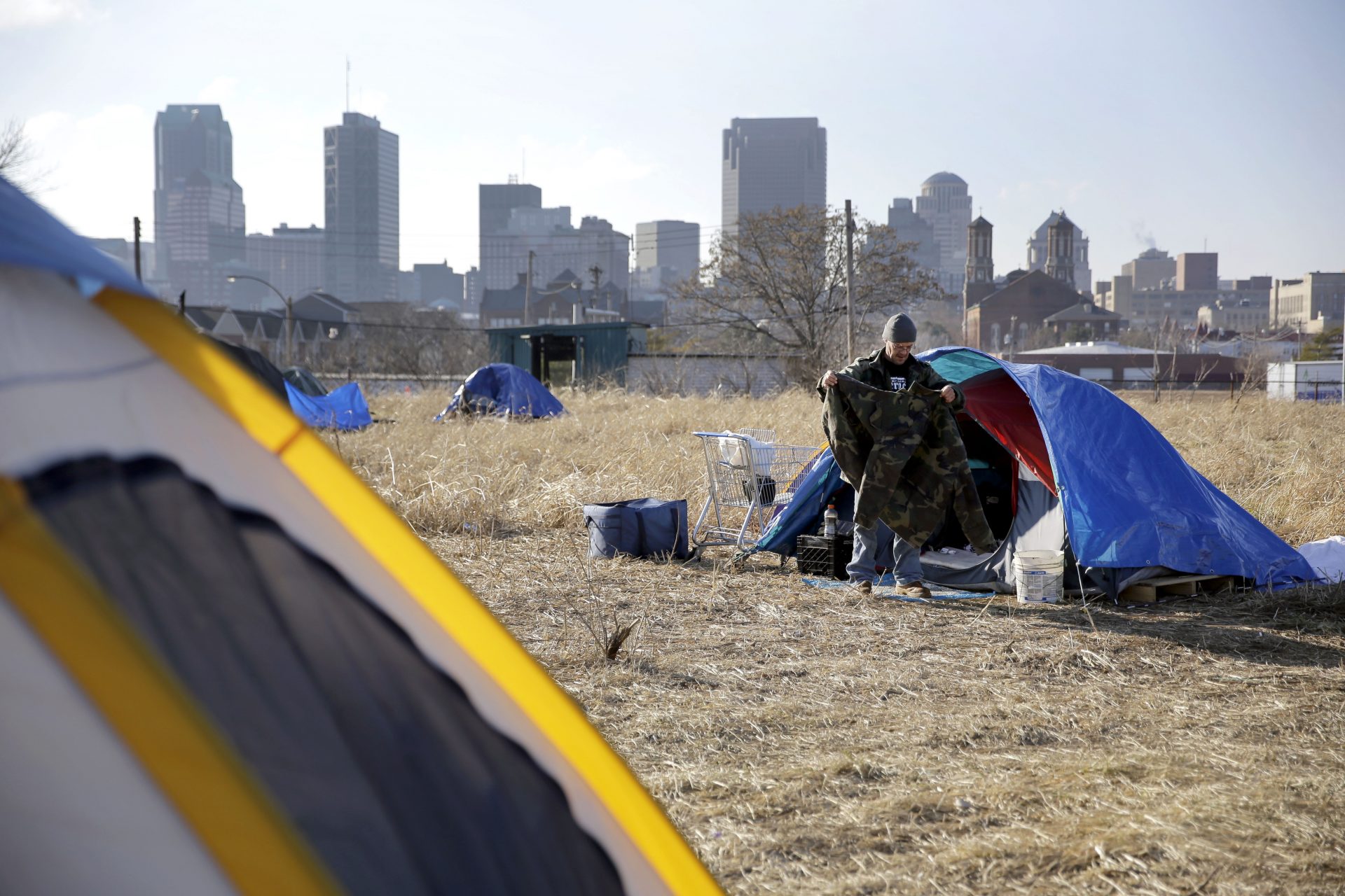 File Photo: Terry, cleans out his tent at a large homeless encampment, near downtown St. Louis. The gap between the haves and have-nots in the United States grew last year. Income inequality in the United States expanded from 2017 to 2018, with several heartland states among the leaders of the increase, even though several wealthy coastal states still had the most inequality overall, according to figures released Thursday, Sept. 26, 2019, by the U.S. Census Bureau.