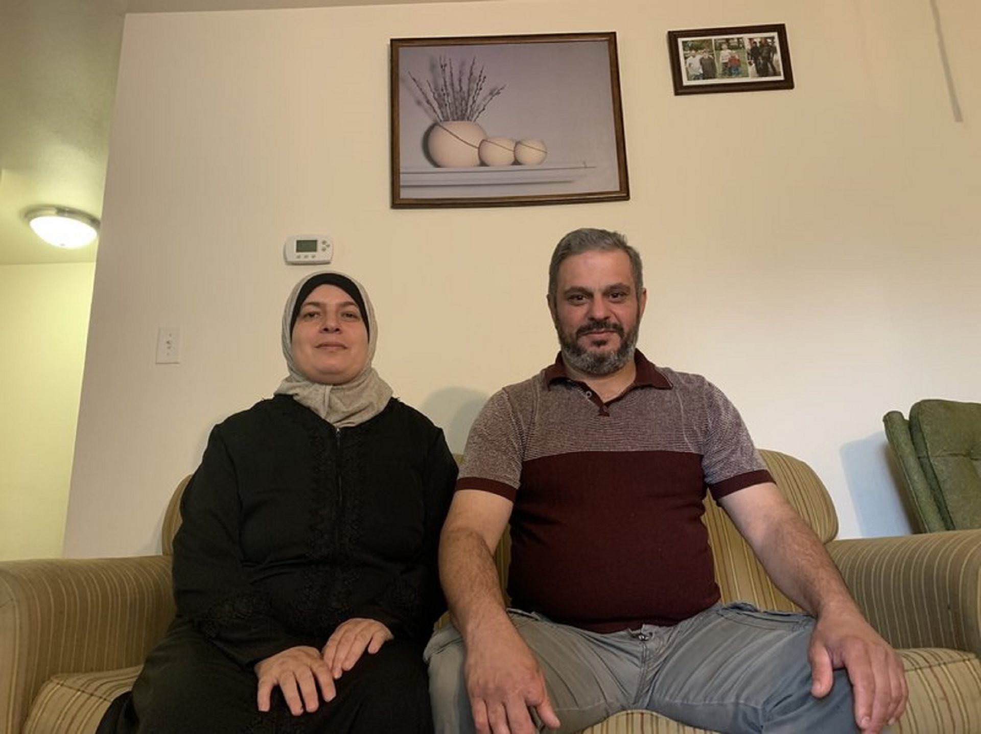 Shatha Abdelber with her husband Mohammed Khalouf in their apartment in Missoula, Mont.