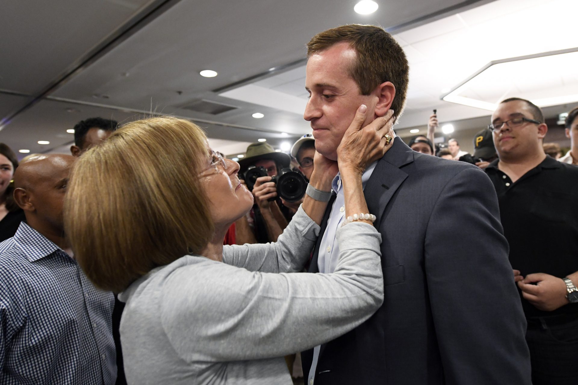 Mattye Silverman of Charlotte, consoles Democrat Dan McCready after he lost a special election for United States Congress in North Carolina's 9th Congressional District to Republican, Dan Bishop, Tuesday, Sept. 10, 2019, in Charlotte, N.C.