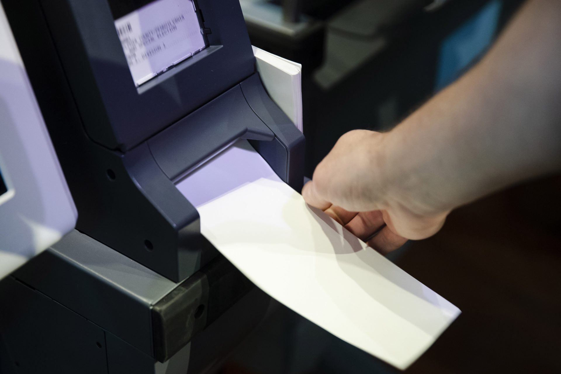 FILE PHOTO: In this June 13, 2019 file photo, an Investigator with the Office of the City Commissioners, demonstrates the ExpressVote XL voting machine at the Reading Terminal Market in Philadelphia.