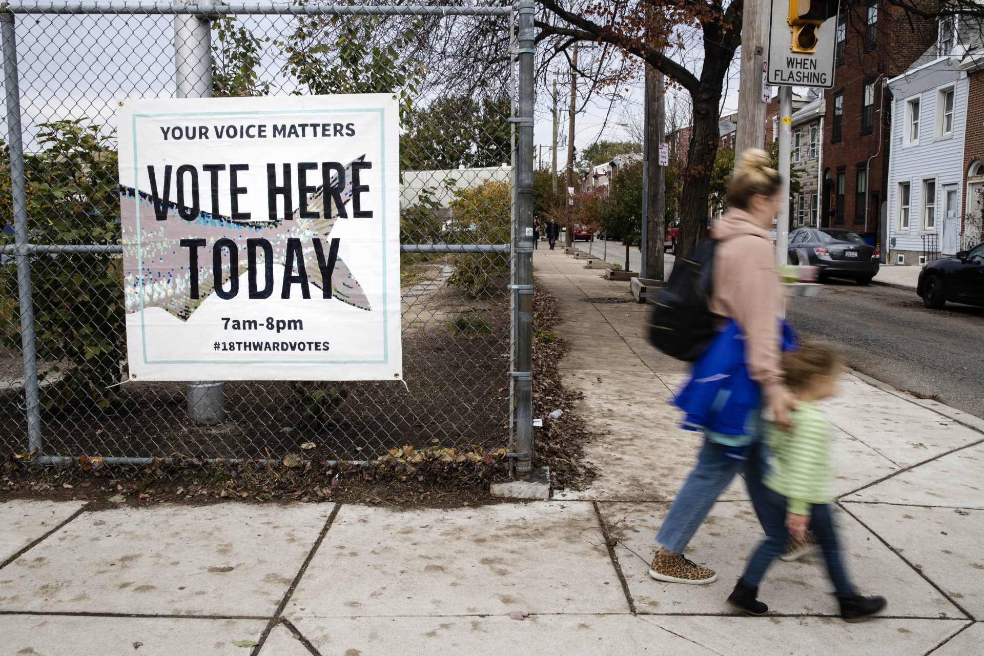 Pedestrians walk past a polling station on Election Day, Tuesday, Nov. 5, 2019 in Philadelphia. Pennsylvania's municipal elections feature contests for two statewide appellate judgeships, as well as some potential firsts in local contests.