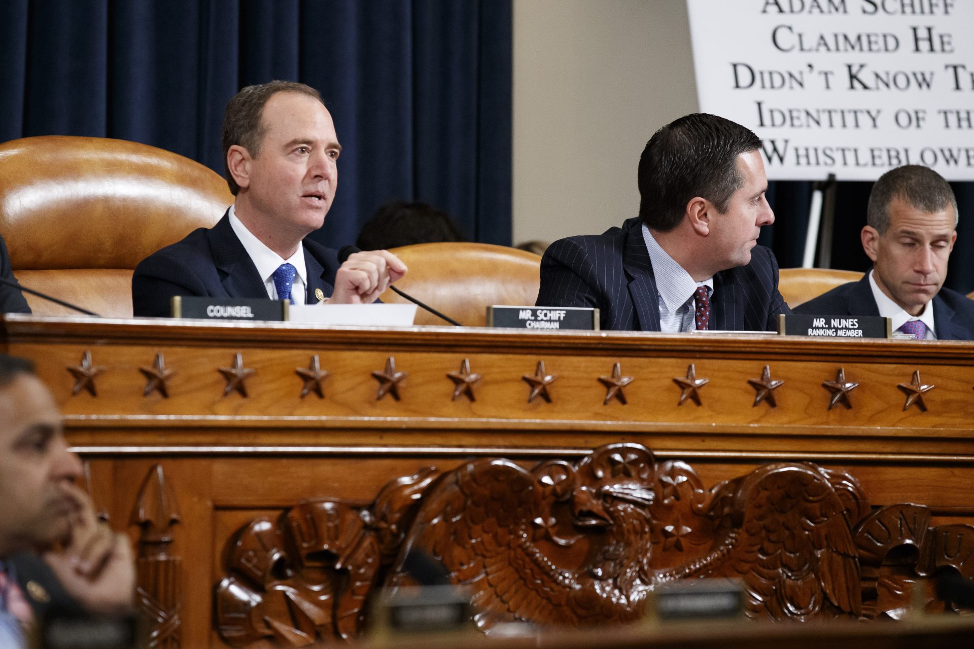 House Intelligence Committee Chairman Adam Schiff, D-Calif., left, gives his closing remarks as U.S. Ambassador to the European Union Gordon Sondland testifies before the House Intelligence Committee on Capitol Hill in Washington, Wednesday, Nov. 20, 2019, during a public impeachment hearing of President Donald Trump's efforts to tie U.S. aid for Ukraine to investigations of his political opponents, as ranking member Rep. Devin Nunes of Calif., is at center.