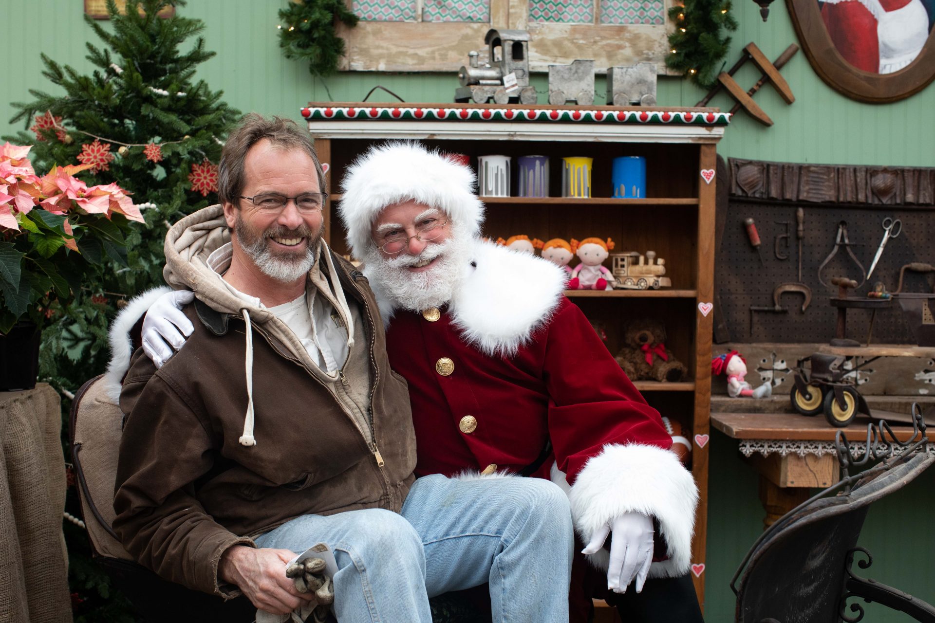 Norm Schultz, Farm Manager of Linvilla Orchards in Media, Pennsylvania poses with Santa Claus, played by Steve Nieman of Springfield, PA. Linvilla Orchards has thrived by diversifying their operations and offering a complete Christmas experience to visitors.