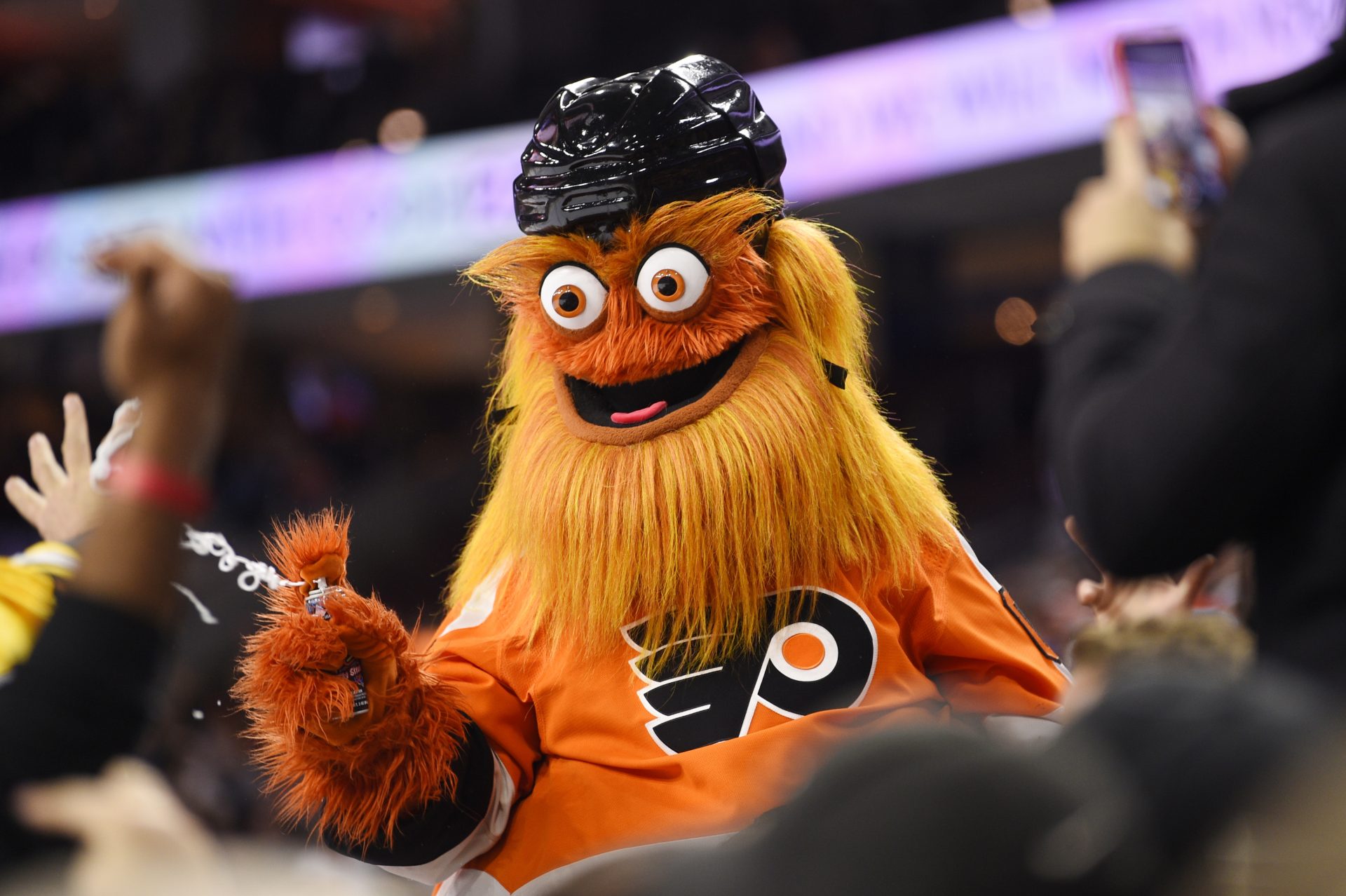 In this Monday, Jan. 13, 2020 file photo, the Philadelphia Flyers' mascot, Gritty, performs during an NHL hockey game in Philadelphia.