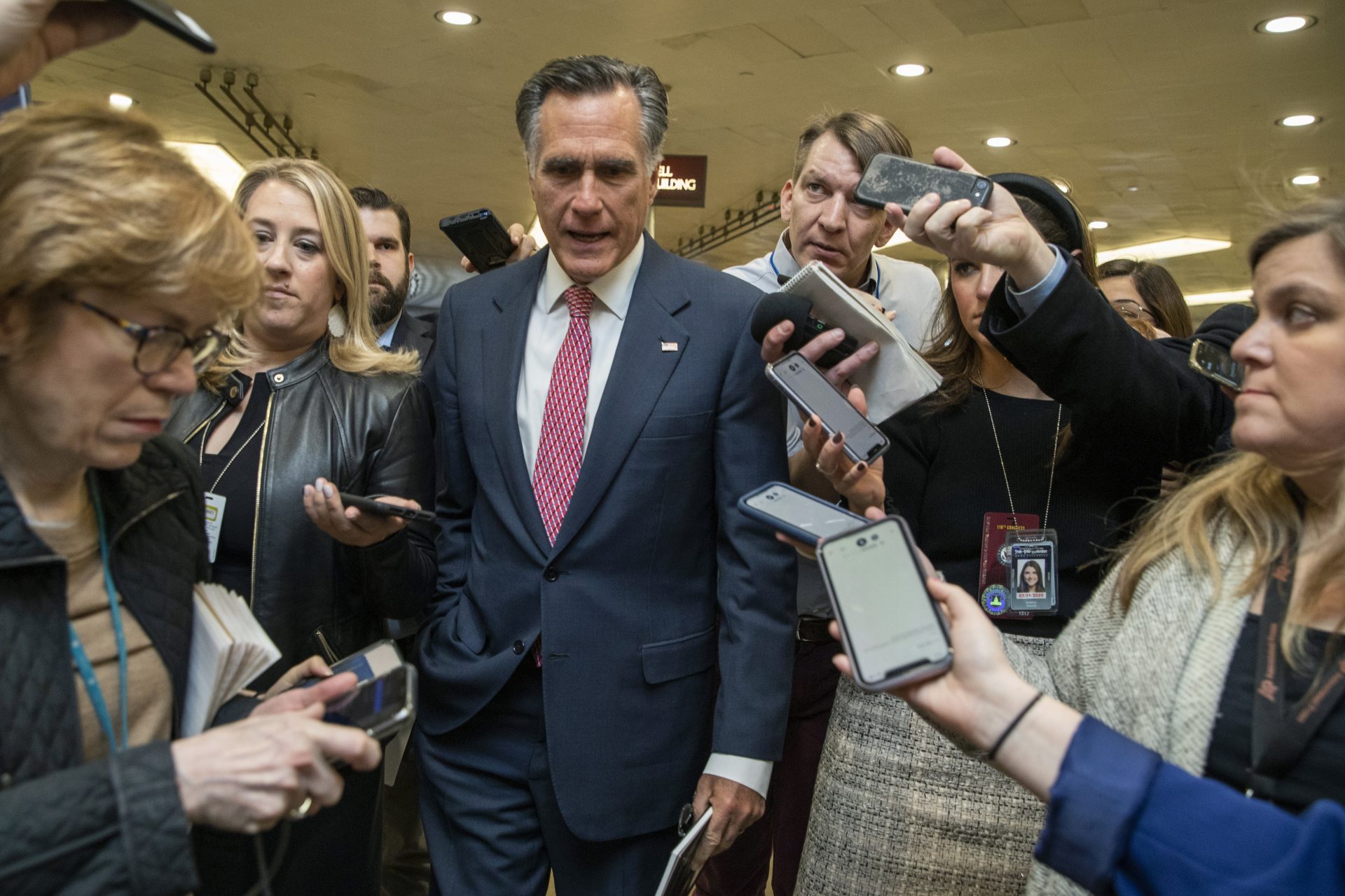 Sen. Mitt Romney, R-Utah, speaks to reporters as he arrives at the Capitol in Washington, Monday, Jan. 27, 2020, during the impeachment trial of President Donald Trump on charges of abuse of power and obstruction of Congress.