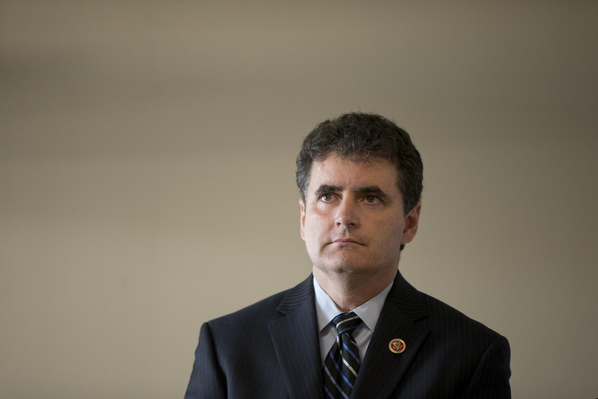 Rep. Mike Fitzpatrick, R-Pa., listens during a news conference Monday, Feb. 10, 2014, at a Fraternal Order of Police lodge in Philadelphia