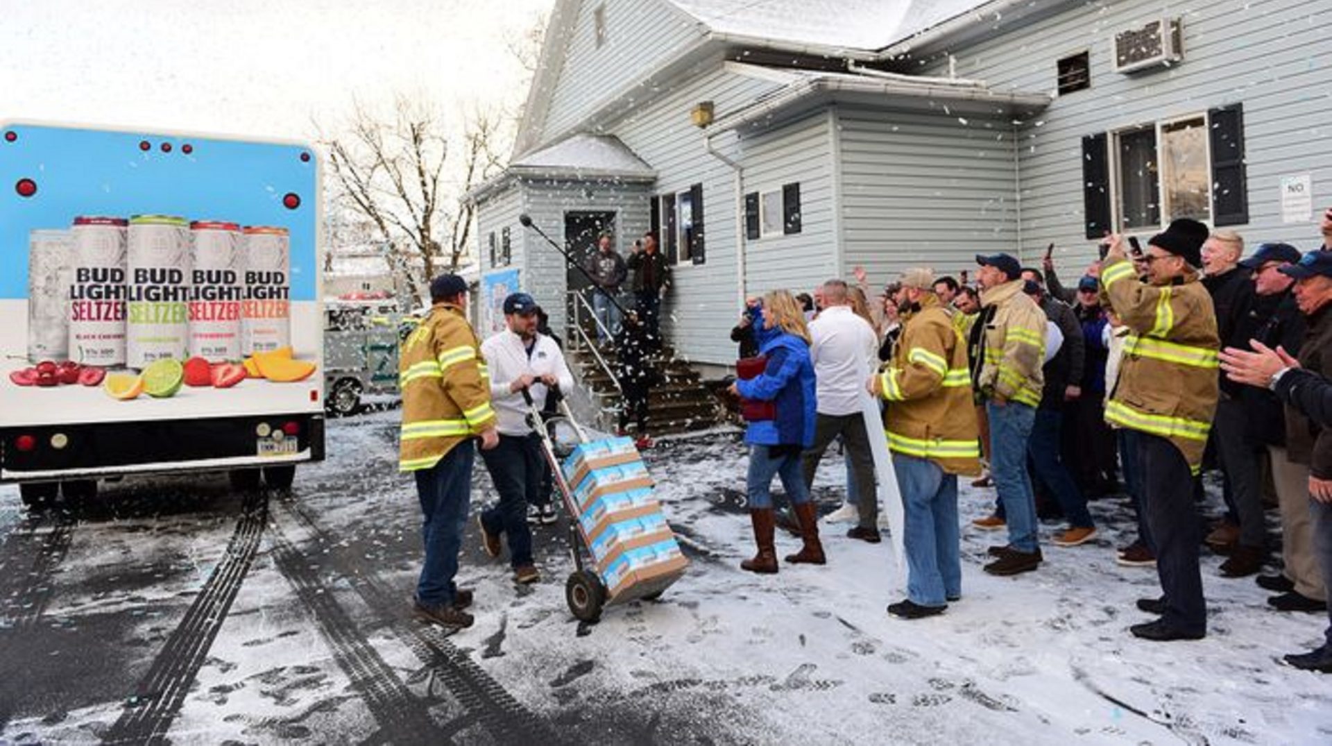 Members of the Seltzer Hose Company cheer the inaugural delivery of Bud Light Seltzer, a new product that their community's name has been both borrowed and amplified for a national launch campaign.