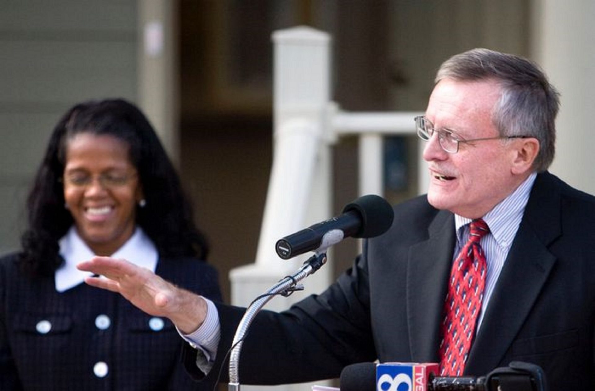 Harrisburg mayoral candidate Linda Thompson listens to Harrisburg Mayor Stephen Reed during a press conference and ribbon cutting ceremony for five new affordable homes nearing completion at Swatara and South 16th Streets. The homes, including a net zero-energy home, are part of the Mount Pleasant Homes community being developed by Tri-County HDC, Ltd.