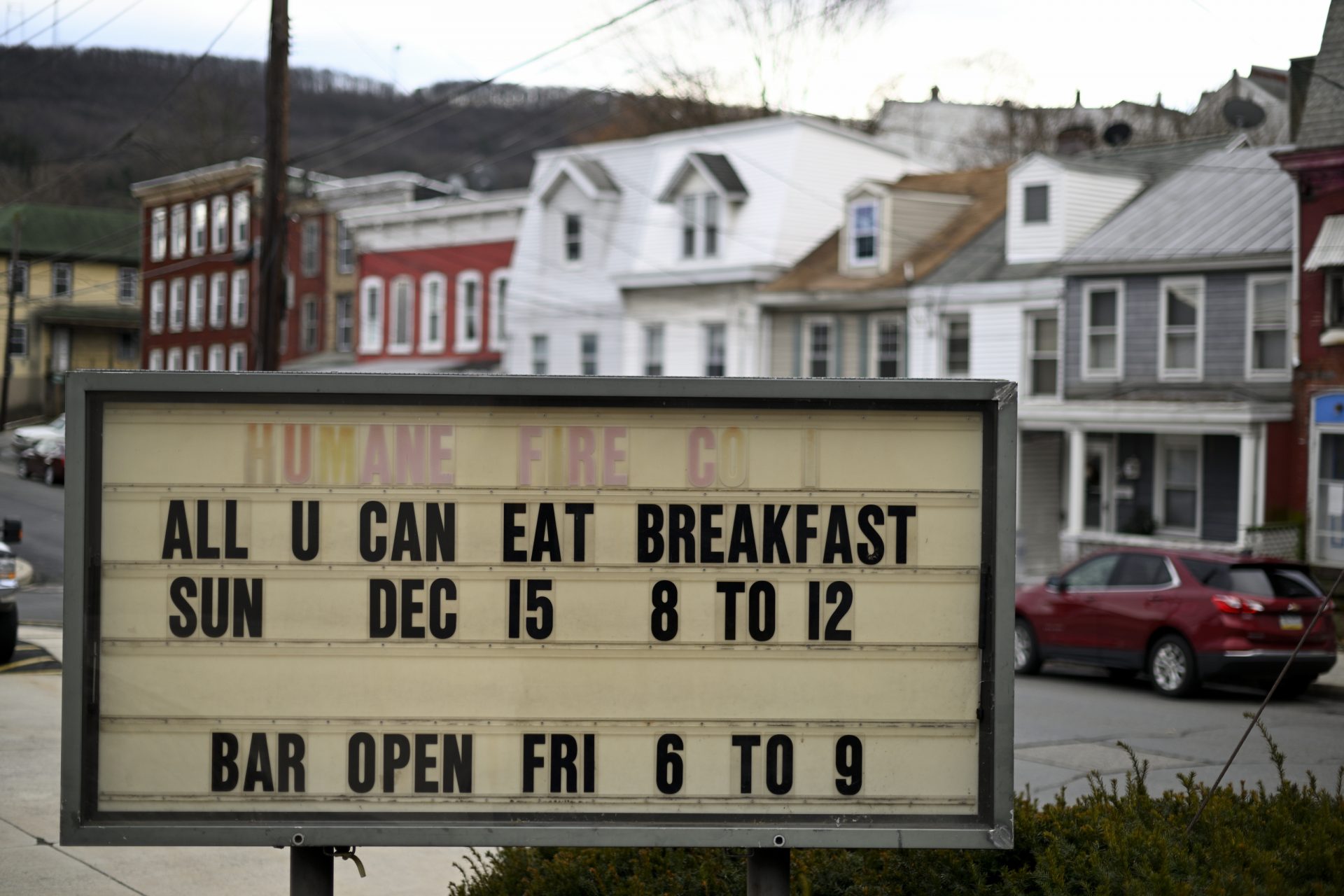 Upcoming social events held at the companies social hall are announced on the board outside Humane Fire Co., in Pottsville, PA, on December 15, 2019.