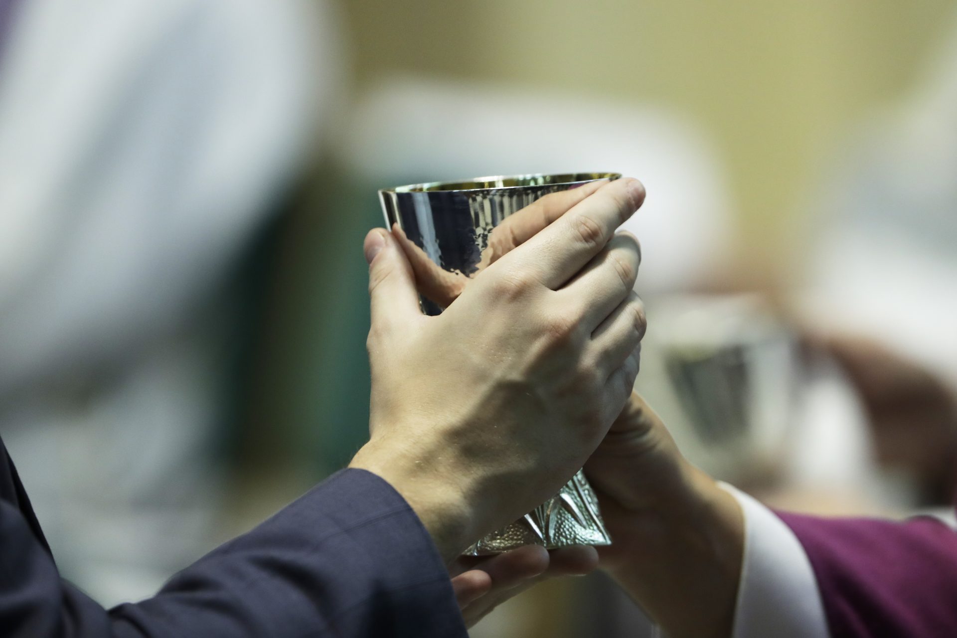 A parishioner Celebrate Communion at the Cathedral Church of Saint Patrick in Harrisburg, Pa., Friday, Aug. 17, 2018.