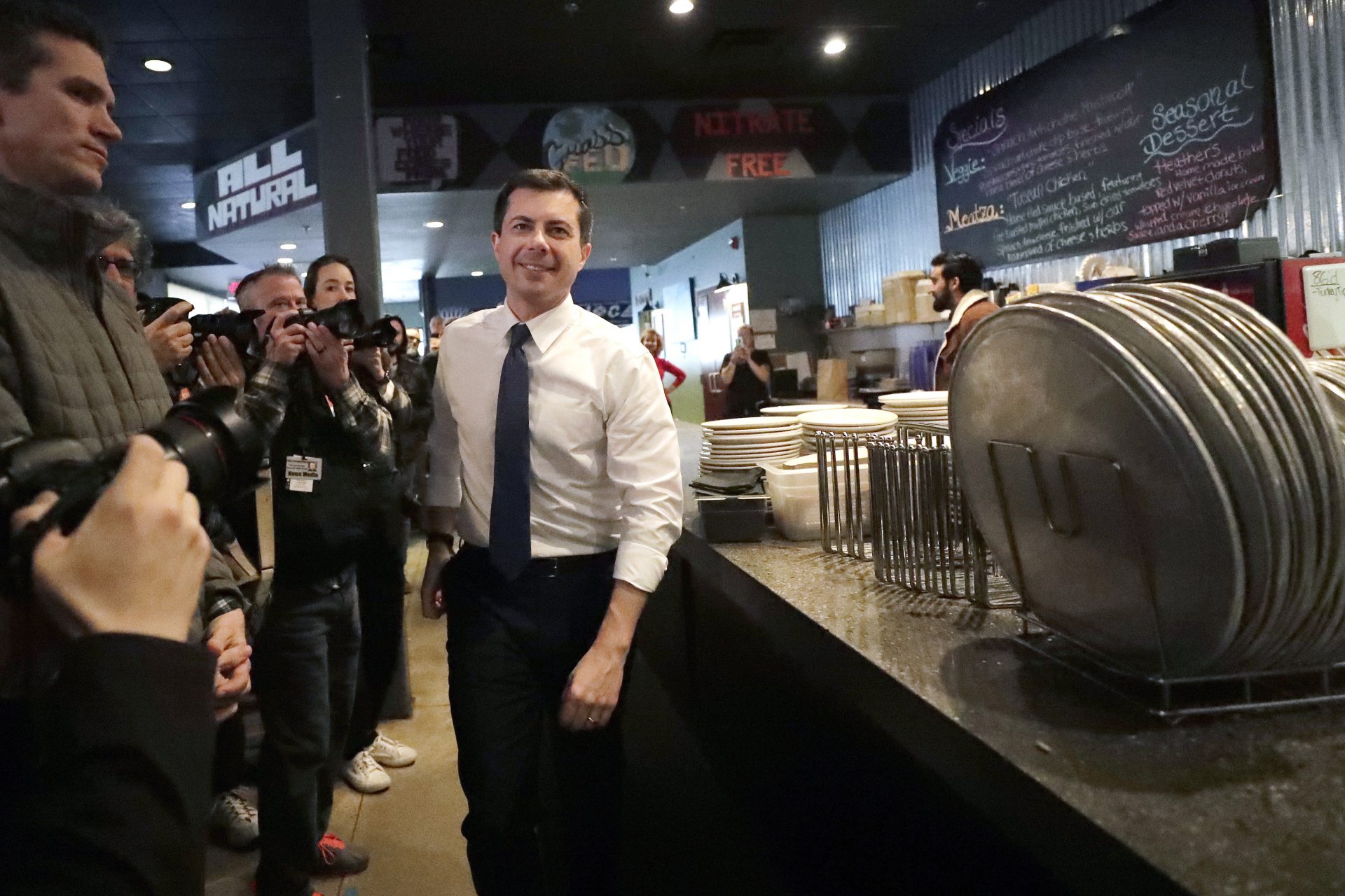 Democratic presidential candidate former South Bend, Ind., Mayor Pete Buttigieg arrives at Community Oven Pizza for a campaign event, Tuesday, Feb. 4, 2020, in Hampton, N.H.