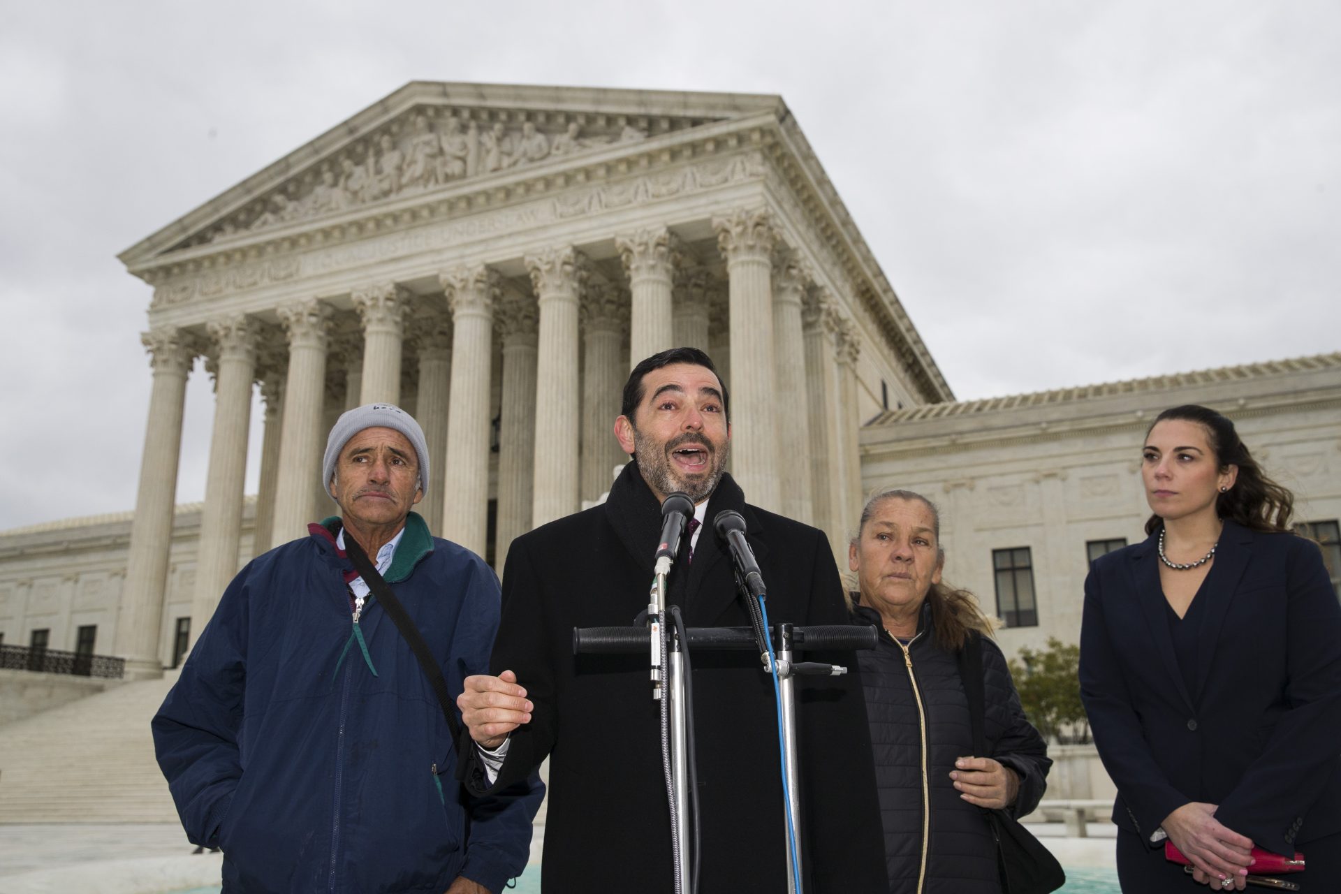 Attorney Cristobal Galindo, second from left, speaks accompanied by Jesus Hernandez, left, and Maria Guereca, and attorney Marion Reilly after oral arguments in front of the Supreme Court, Tuesday, Nov. 12, 2019 in Washington. The case involves U.S. border patrol agent Jesus Mesa, Jr., who fired at least two shots across the Mexican border, killing Sergio Adrian Hernandez Guereca, 15, who'd been playing in the concrete culvert between El Paso and Cuidad Juarez.