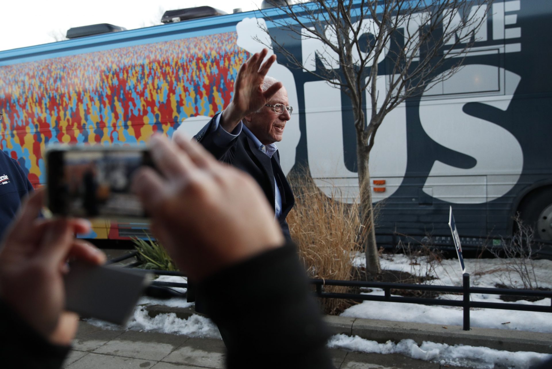 Democratic presidential candidate Sen. Bernie Sanders, I-Vt., waves as he leaves after speaking at a Super Bowl watch party campaign event, Sunday, Feb. 2, 2020, in Des Moines, Iowa.