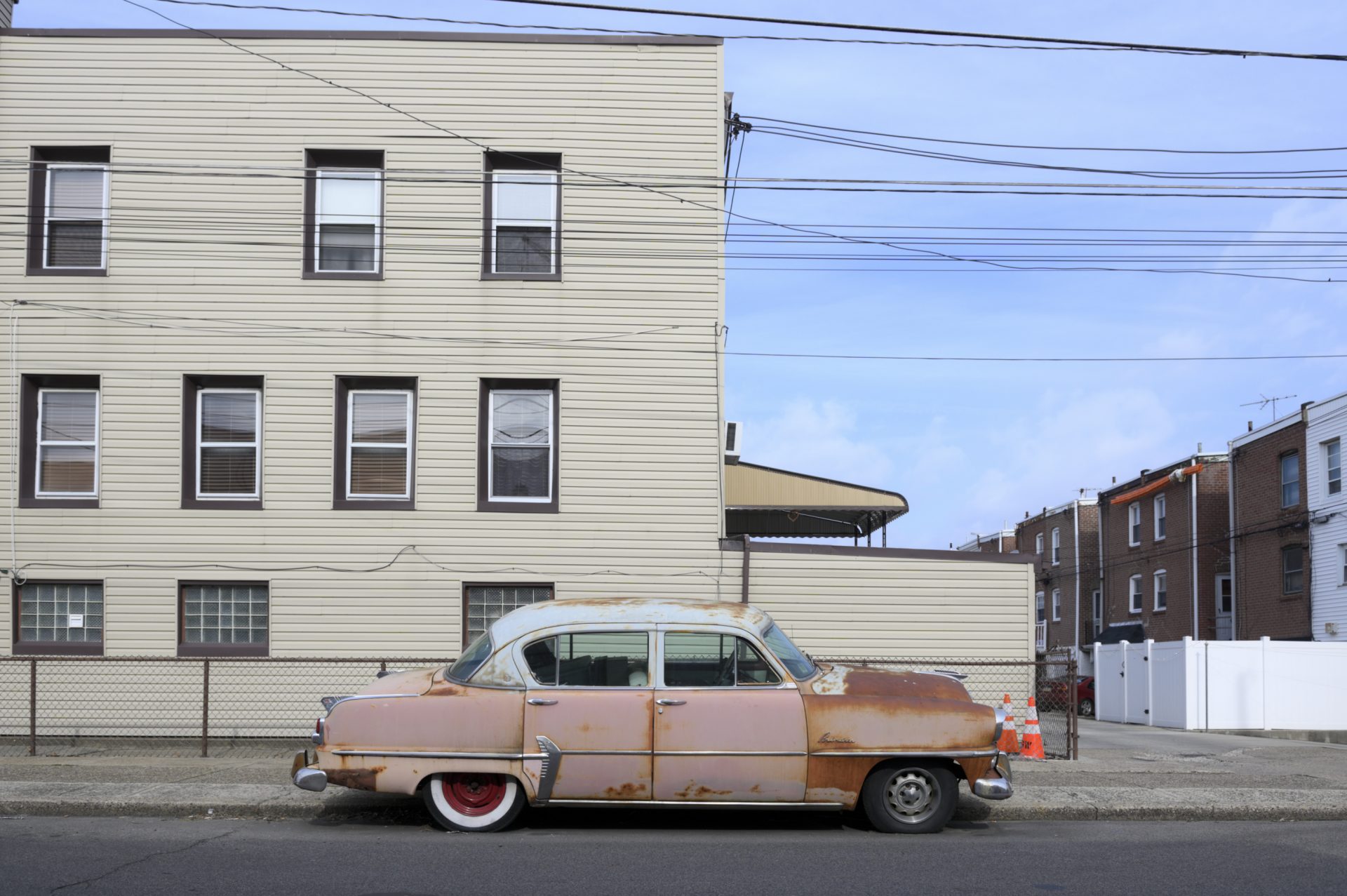 A vintage and rust stained Plymouth is parked near the intersection of Bath St. and Gillingham St. in the Bridesburg neighborhood of Philadelphia, PA, on February 28, 2020.
