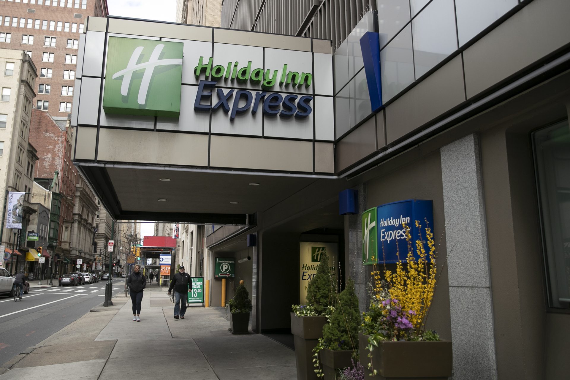 The Holiday Inn Express at 13th and Walnut in Center City is photographed on Tuesday, March 24, 2020. The city is planning to turn the hotel into Philadelphia’s first coronavirus quarantine site, and use it to house homeless people who test positive for the virus, according to two people with knowledge of the plans.
