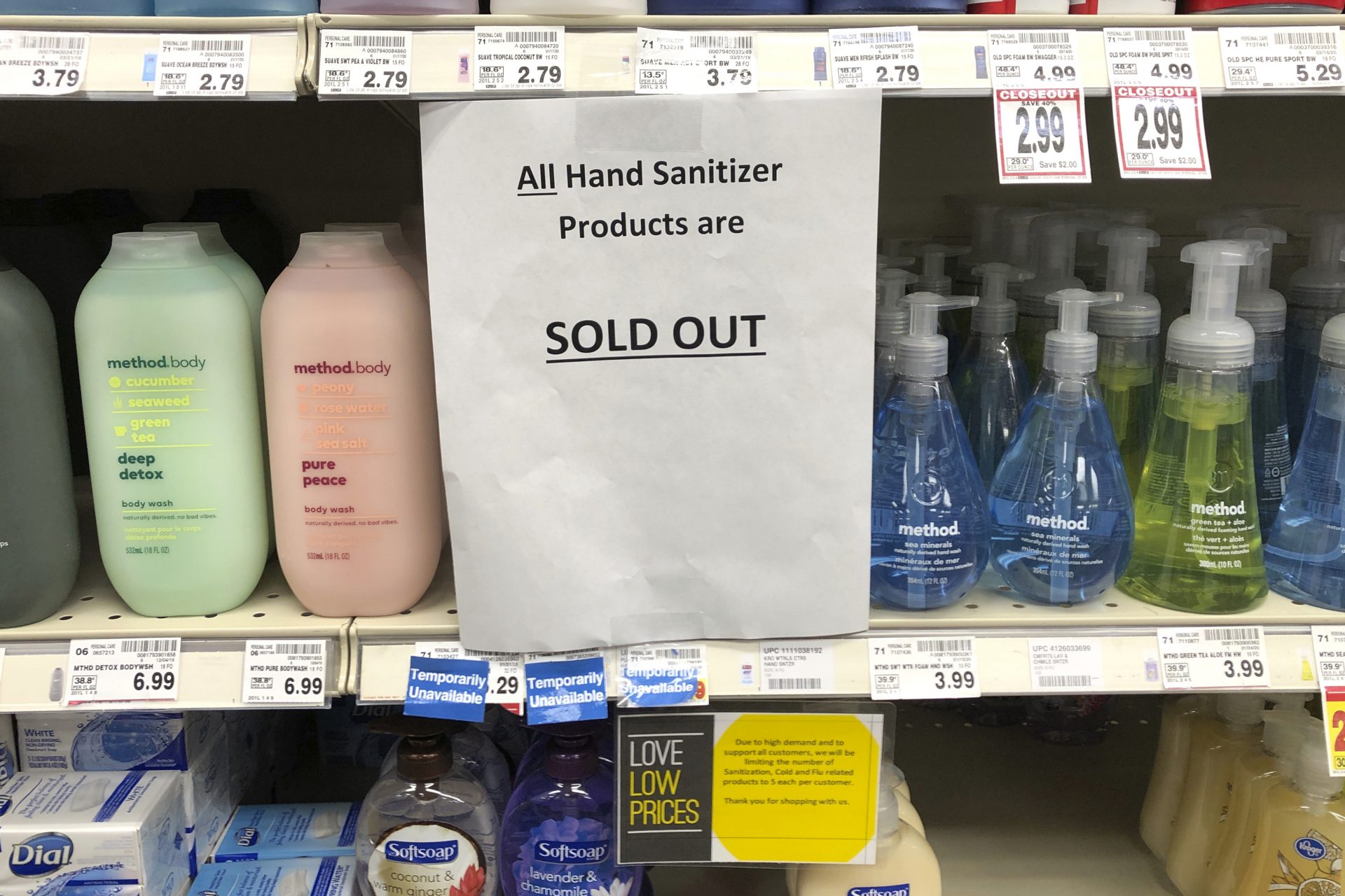A sign on a shelf at a QFC grocery store in Kirkland, Wash., advises shoppers Tuesday, March 3, 2020 that all hand sanitizer products are sold out. Fear of the coronavirus has led people to stock up on the germ-killing gel, leaving store shelves empty and online retailers with sky-high prices set by those trying to profit on the rush. The store is located near the Life Care Center of Kirkland, which has been tied to several cases of the COVID-19 coronavirus.