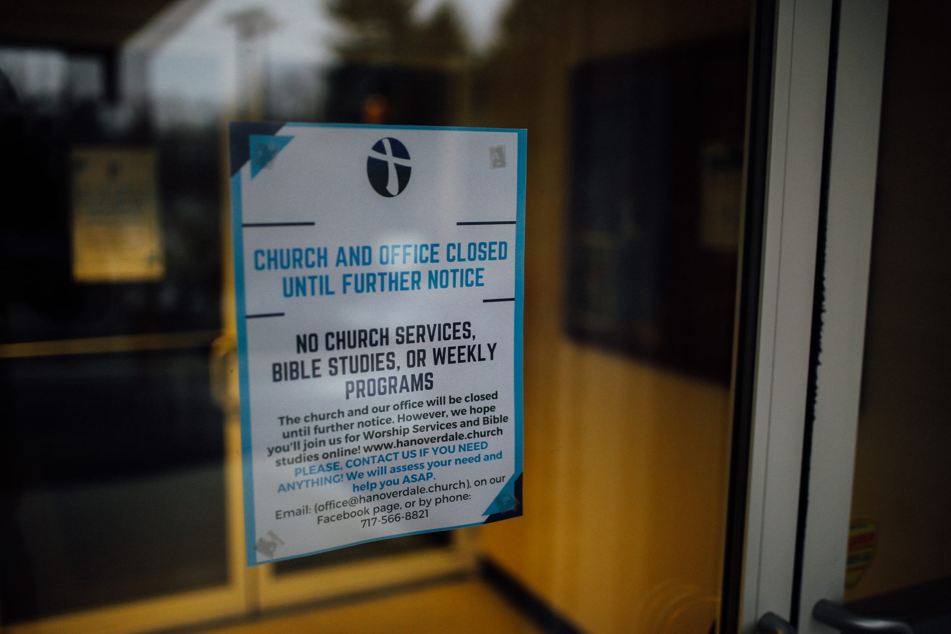 A sign on the Hanoverdale Church of The Brethren in Hummelstown, Pa., shows the church and office are closed until further notice during the coronavirus pandemic and statewide stay-at-home order.