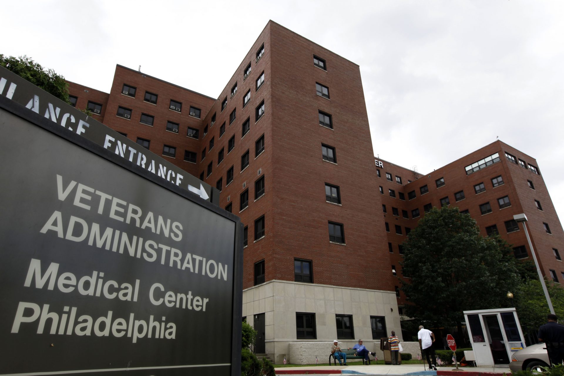 Peaople stand outside the Veterans Administration Medical Center in Philadelphia, Monday, June 22, 2009. Scores of veterans were given incorrect radiation doses in a common surgical procedure to treat prostate cancer during a six-year period at the medical center, according to newspaper reports Sunday.