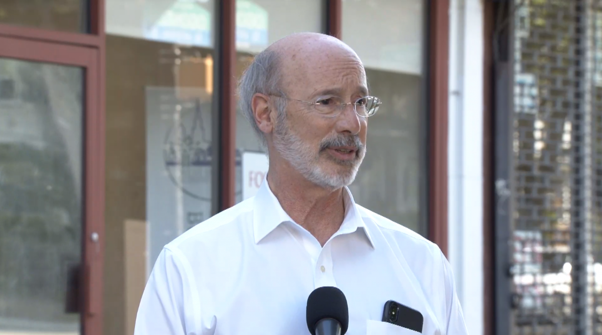 Gov. Tom Wolf speaks to reporters Monday evening in Philadelphia, where he was touring parts of the city damaged during the weekend’s protests over the death of George Floyd in Minneapolis.