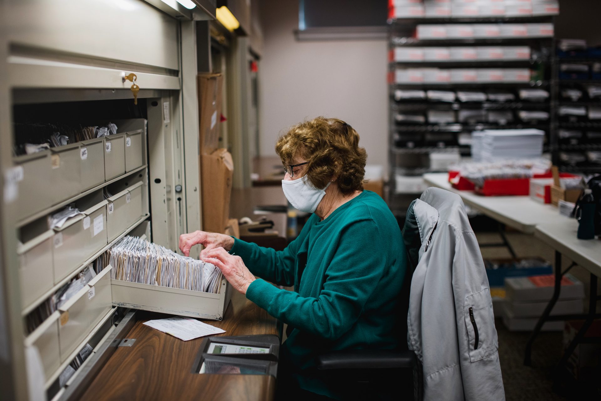 Ellen Ortt, 81, looks through old voter registration files at the Voter Registration office in the Lehigh County Government Center in Allentown, PA., on Tuesday, September 15, 2020. Ortt is looking to see which files need to be update with a new address or a party switch.