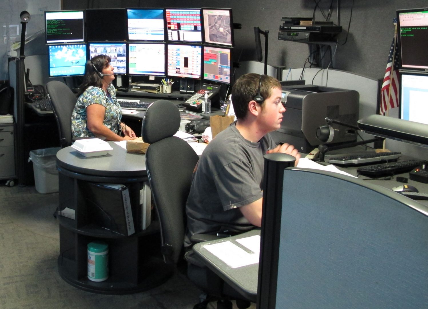 Sheila Delosa and another Dispatcher work in Tioga County's 911 center