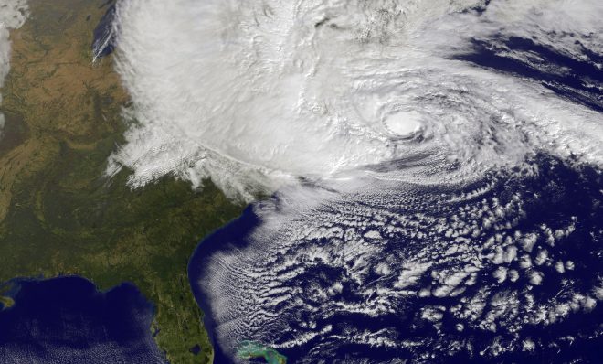 Scientists have been studying the link between climate change and extreme weather events such as Hurricane Sandy, shown here in a NASA image, which left more than 1.3 million Pennsylvanians in the dark in 2012.