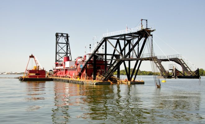 The dredger named the "Illinois" uses its already lowered arm, 35 feet into the Delaware River, to suck out the sediment. The project went through an environmental assessment as part of the National Environmental Policy Act.