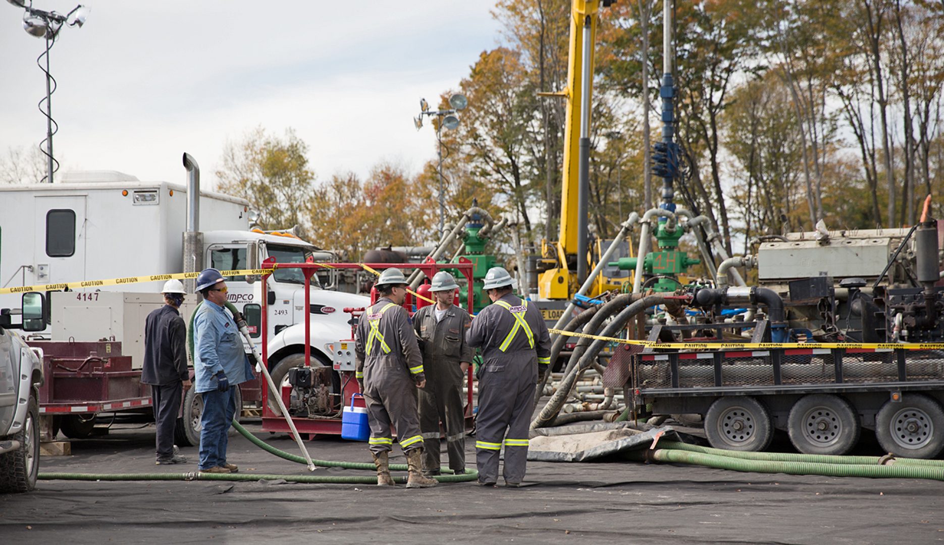 Workers at a frack site in Harford Township, Pa. Under new EPA rules, gas drillers will have to step up their measurements and reporting of methane leaks.