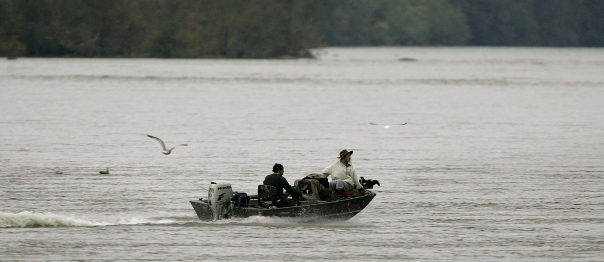 Fisherman on the Susquehanna River. It supplies half the freshwater flowing into the Chesapeake Bay.