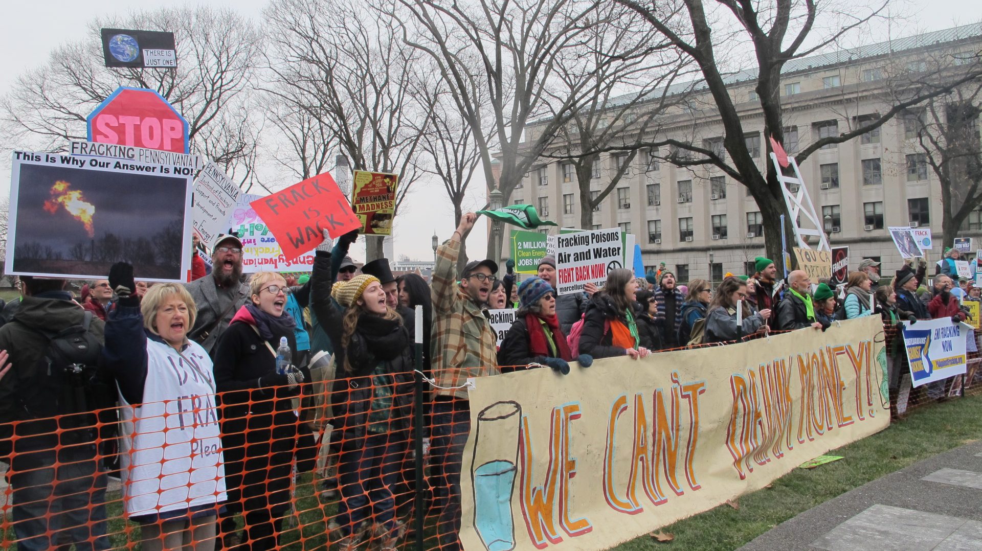 In this 2015 file photo, people demonstrate against fracking at Gov. Tom Wolf's inauguration. Eight people were arrested, but charges were later dismissed. 
