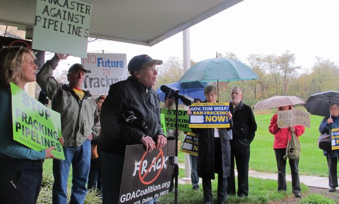 In this 2015 photo, anti-fracking activist Dory Hippauf protests outside a state Department of Environmental Protection meeting on pipelines. DEP has been criticized by opponents of the cross-state Mariner East pipeline for not doing enough in response to repeated permit violations during construction of that project.