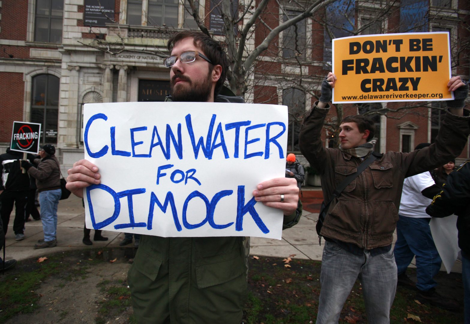 Protestors called for clean water for Dimock in a Philadelphia demonstration in 2012. Two families that sued Cabot Oil & Gas have settled.
