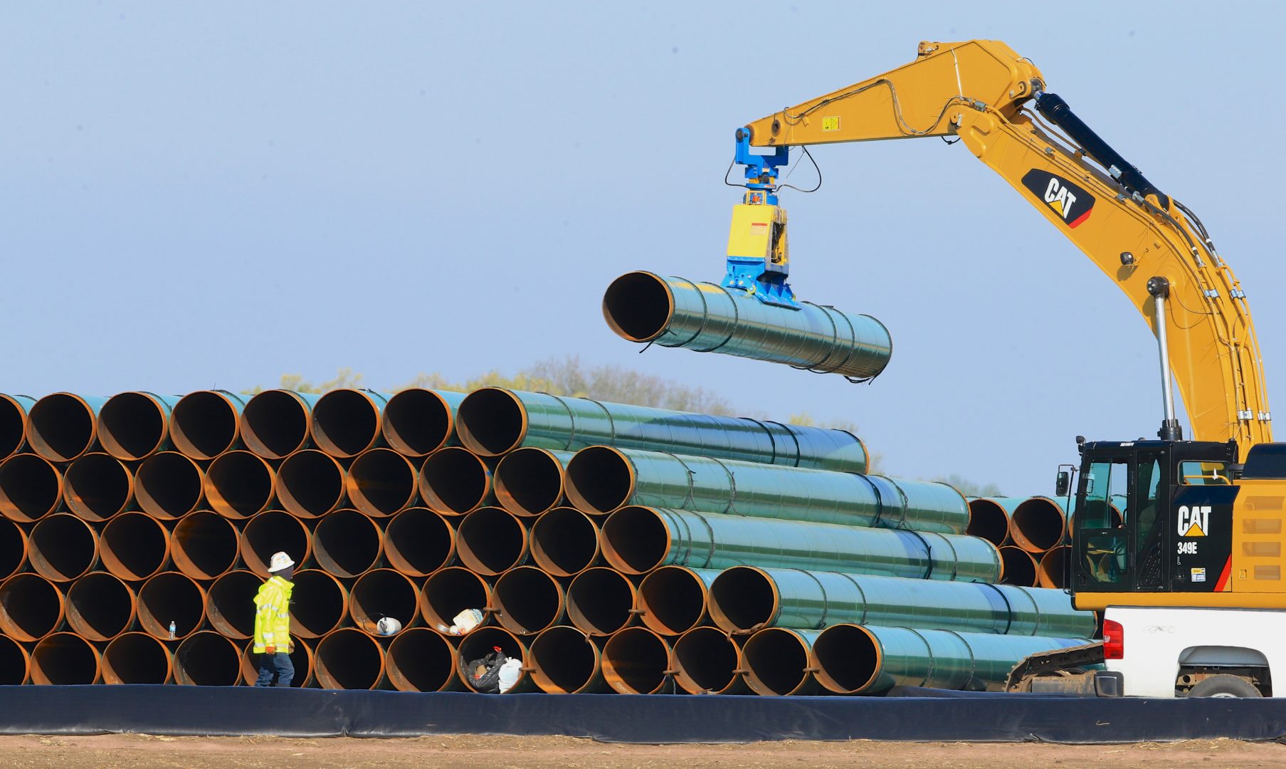  In this May 9, 2015 file photo, pipes for the proposed Dakota Access Pipeline are stacked at a staging area in Worthing, S.D. 