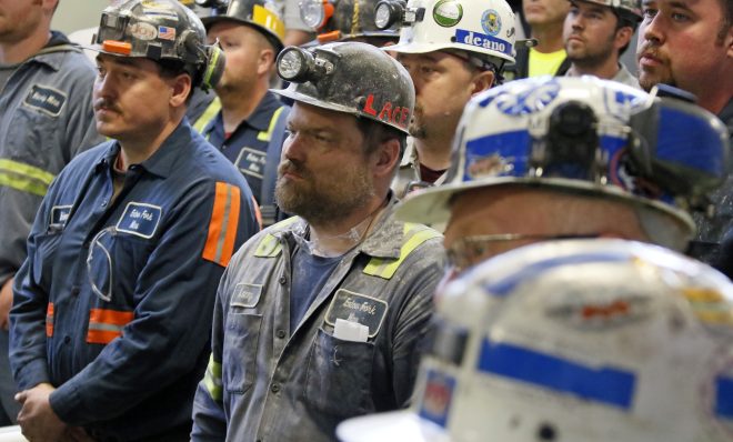 A group of coal miners listen to former U.S. Environmental Protection Agency Administrator Scott Pruitt during his visit to Consol Pennsylvania Coal Company's Harvey Mine in Sycamore, Pa., Thursday, April 13, 2017. 