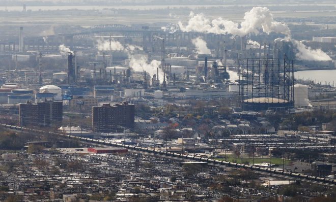 FILE PHOTO: A refinery, homes and tank cars is seen Tuesday, Nov. 24, 2015, in Philadelphia.