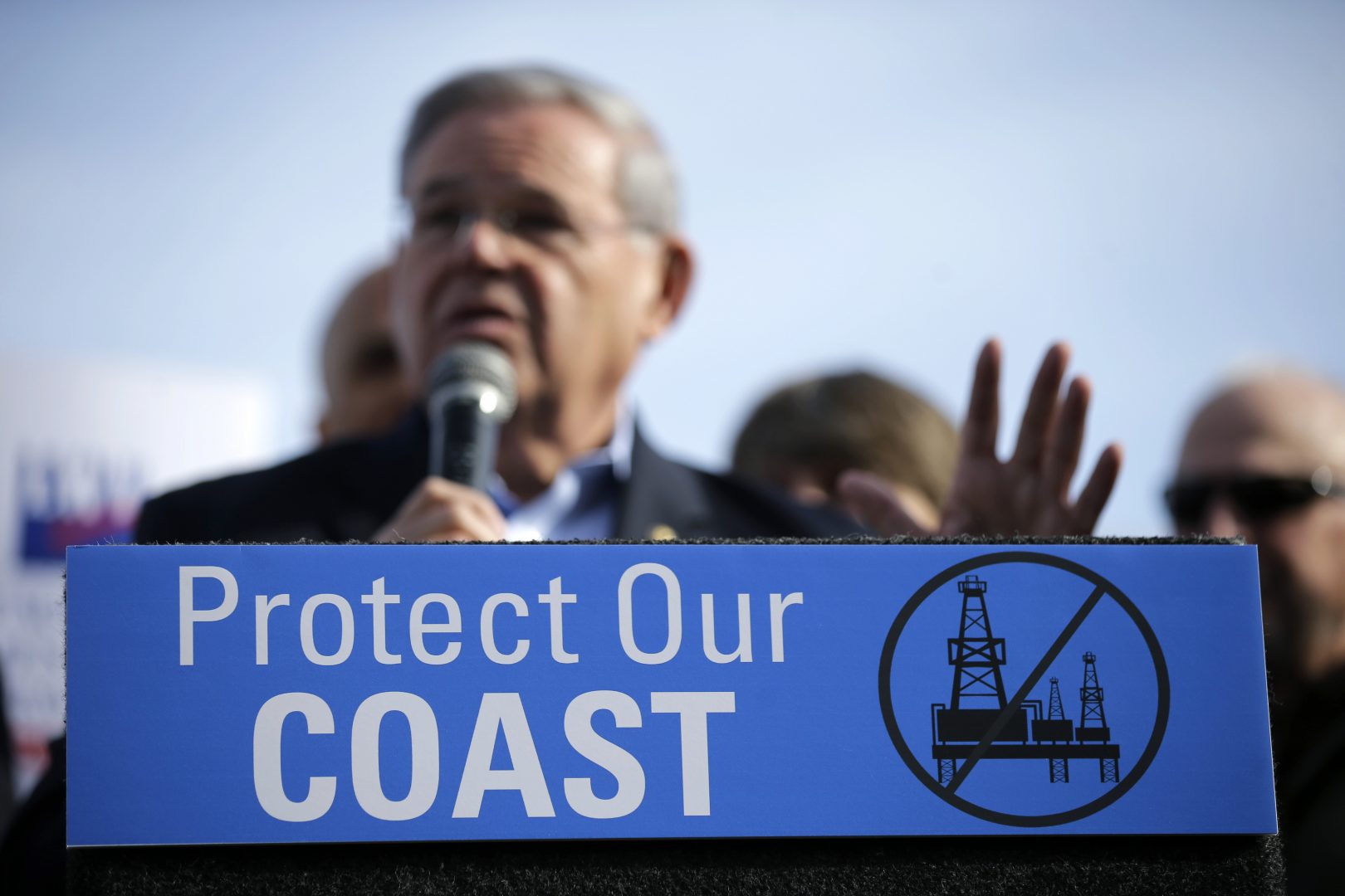FILE - In this Jan. 31, 2016 file photo, Democratic U.S. Sen. Bob Menendez addresses a large rally in Asbury Park, N.J., opposing federal plans that would allow oil and gas drilling in the Atlantic Ocean. The Obama administration has moved to restrict access to offshore oil drilling leases in the Atlantic, as well as off Alaska. But President-elect Trump has said that he intends to open up offshore drilling, and environmentalists and coastal businesses say it could be the first major fault line that divides them from the new president. 