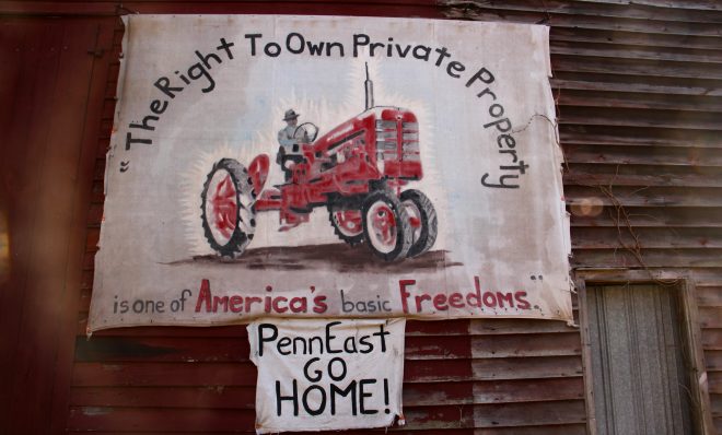 A sign on the side of a barn on Riegelsville Road in Holland Township, New Jersey, shows local opposition to the PennEast pipeline. 