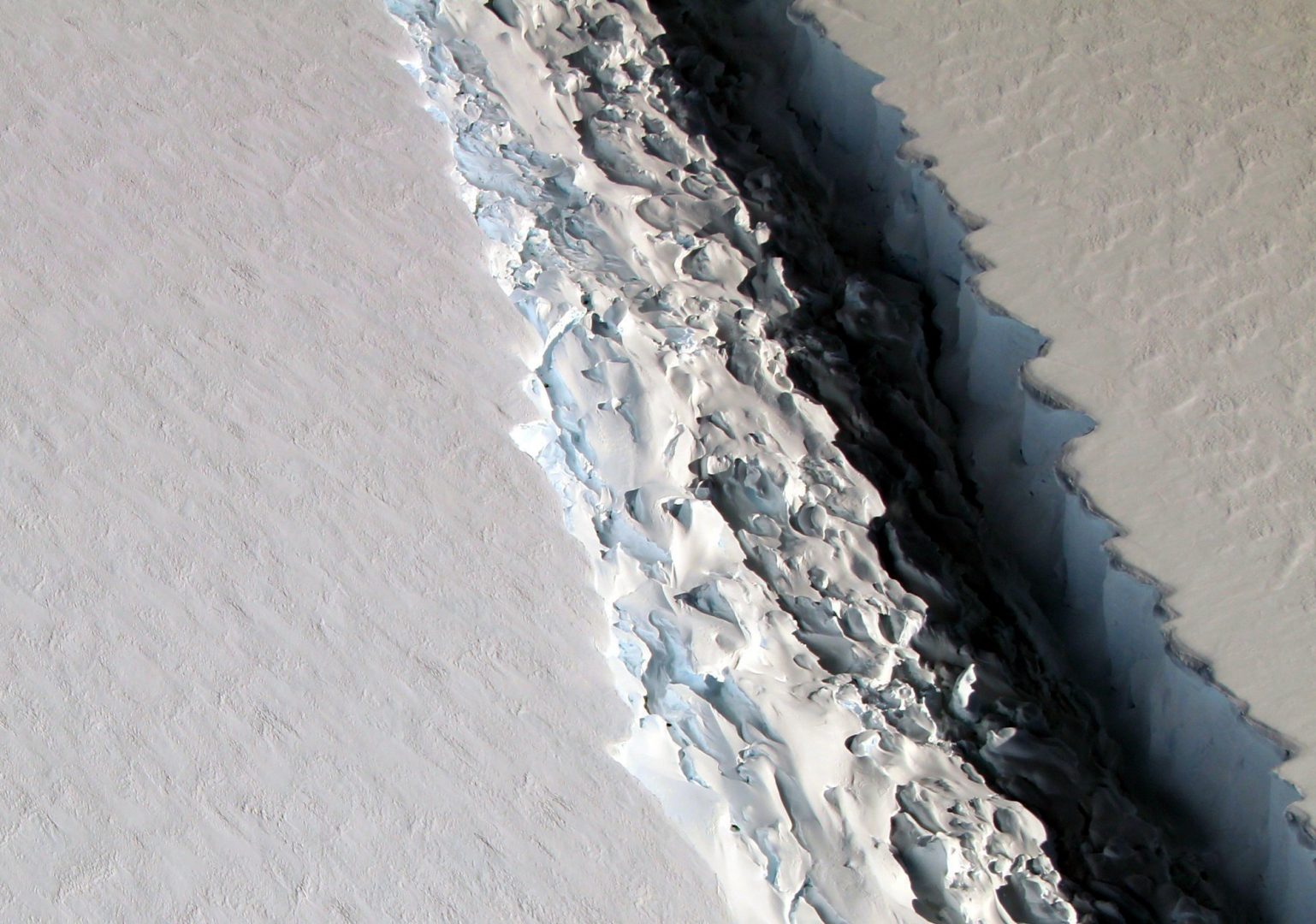 FILE PHOTO: This Nov. 10, 2016 aerial photo released by NASA, shows a rift in the Antarctic Peninsula's Larsen C ice shelf. 
