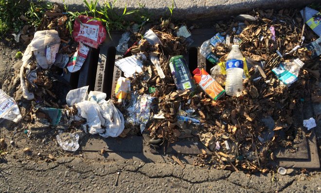 Stormwater drains in Philadelphia have traps to capture trash, but smaller pieces of plastic can get through all the way to the river. 