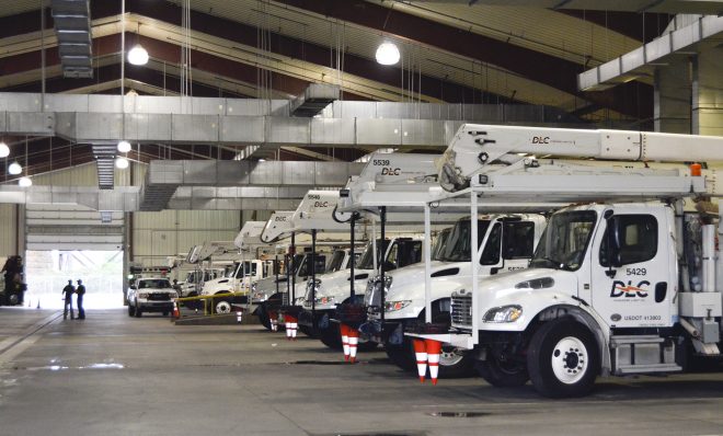 FILE PHOTO: Duquesne Light crews prepare their trucks for the day ahead installing new transformers, poles and auto-switches to reroute power around outages.