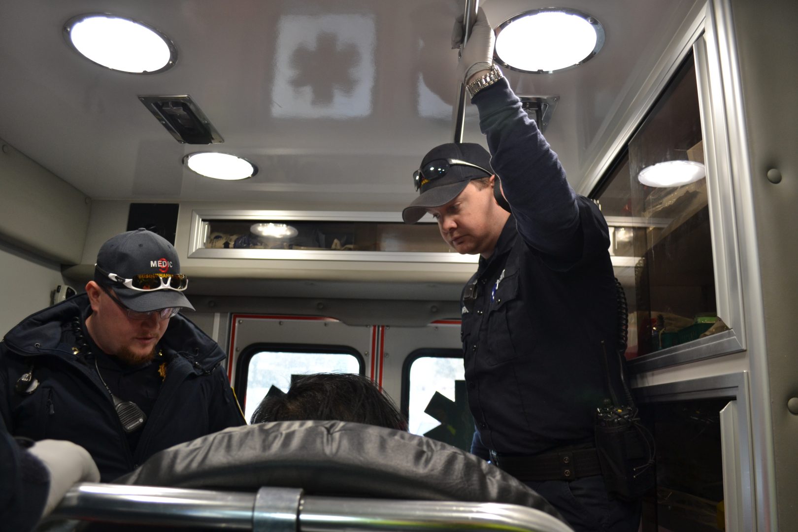 Susquehanna Township EMS tend to a patient being transported to the hospital. (Brett Sholtis/Transforming Health)