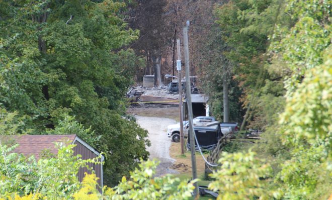 The remnants of a home and garage destroyed by the explosion of the Revolution Pipeline. 