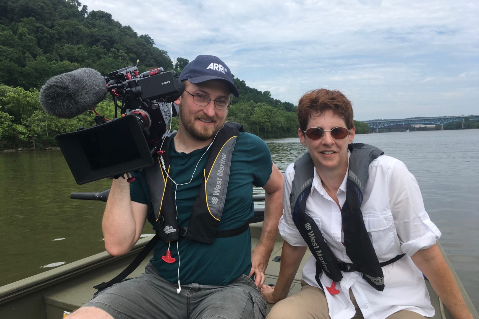 Gina Catanzarite, writer and producer, and Glenn Syska, director of photography and editor, on the “set” of their documentary, “Downstream.” 