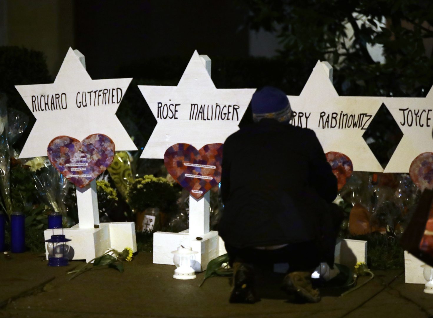Stars of David with the names of those killed in a deadly shooting at the Tree of Life Synagogue stand in front of the synagogue in Pittsburgh, Sunday, Oct. 28, 2018. 