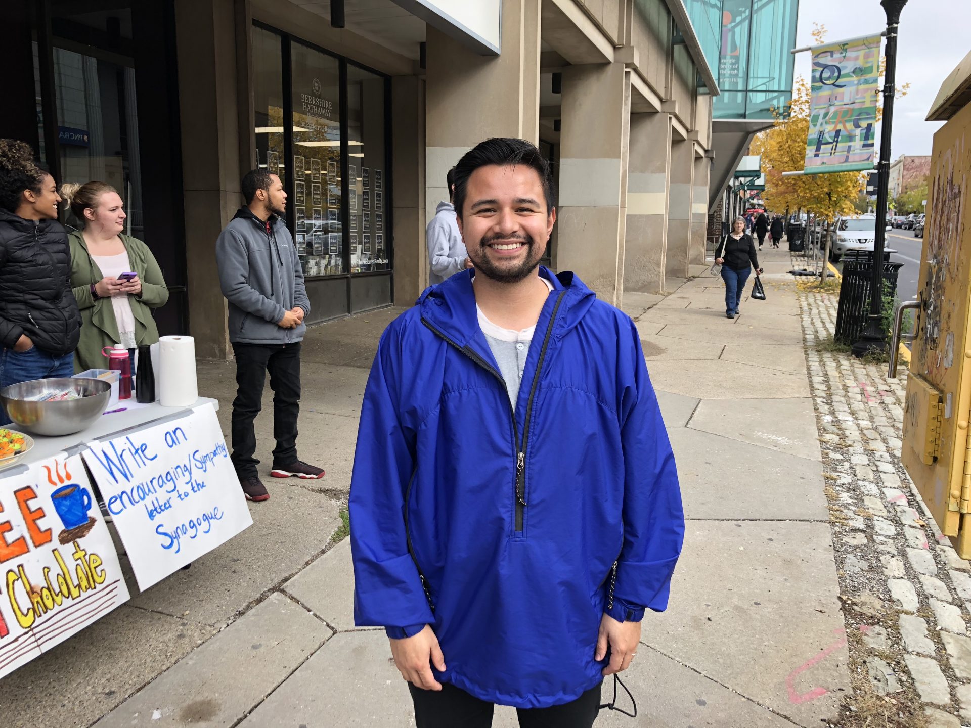 Diego Colmenares grew up in Colombia and moved to Pittsburgh about 10 years ago. He and others with Youth With A Mission offered free hot chocolate and snacks to people in Squirrel Hill on Thursday Nov. 1, 2018