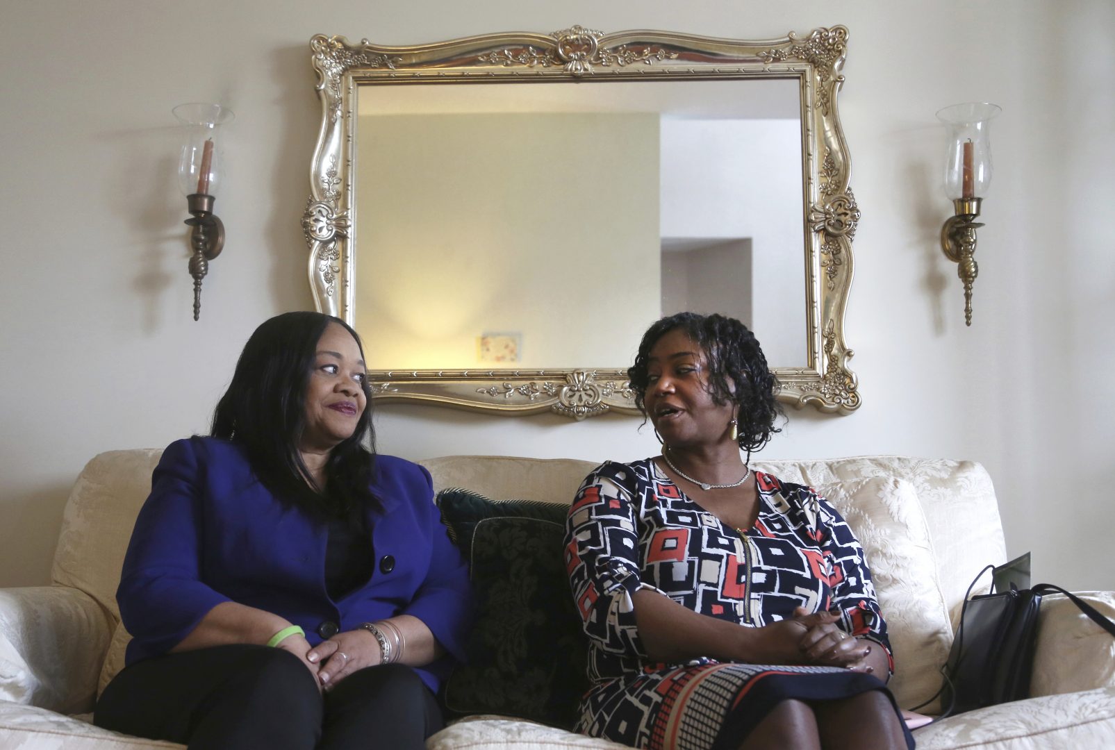Sandra Thompson, right, speaks alongside Sandra Harrison, both golfers and members of a group of local women known as Sisters in the Fairway, during an interview with The Associated Press, Tuesday April 24, 2018 in York, Pa. Officials at the Grandview Golf Club in York called police on the group Saturday, accusing them of playing too slowly and holding up others behind them. On Sunday club co-owner JJ Chronister told the York Daily Record she called the women personally to 