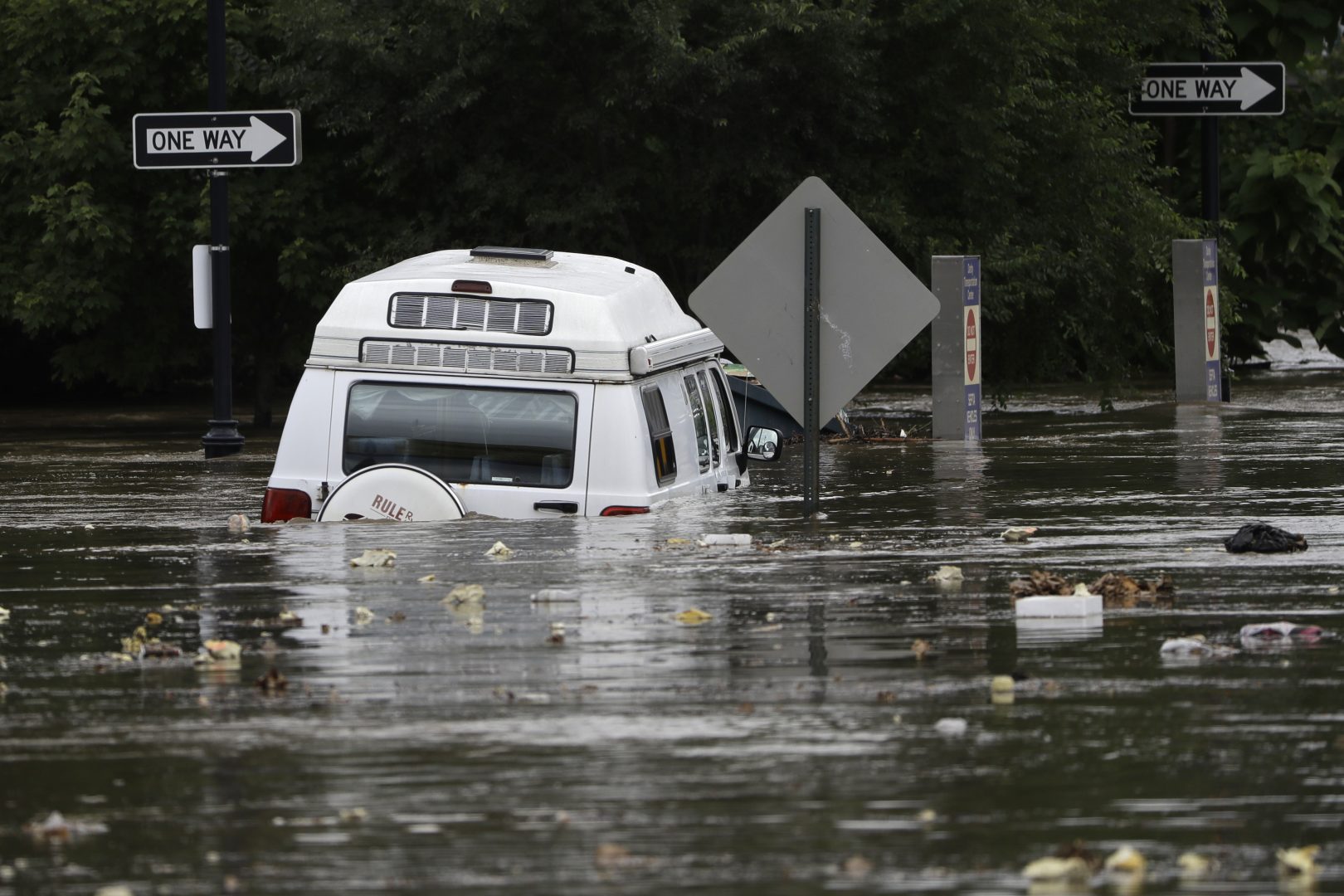 Floodwaters partly submerge a van in Darby, Pa., Monday, Aug. 13, 2018. 
Climate models predict the region will experience more precipitation going forward. 2018 was Pennsylvania's wettest year on record.