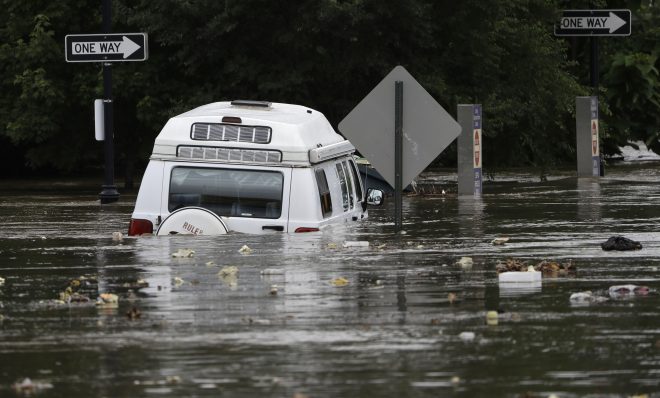 Floodwaters partly submerge a van in Darby, Pa., Monday, Aug. 13, 2018. 
Climate models predict the region will experience more precipitation going forward. 2018 was Pennsylvania's wettest year on record.